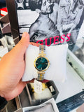 GUESS Women’s Emerald Green Dial Two-Tone Bracelet Watch